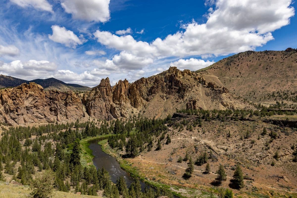 Smith Rock rising over the Crooked River in Central Oregon, with juniper and sage in the foreground.
